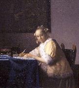 Johannes Vermeer A lady writing. oil on canvas